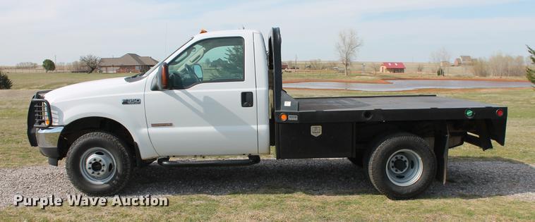 image for item AP9336 2004 Ford F350 Super Duty XLT flatbed pickup truck
