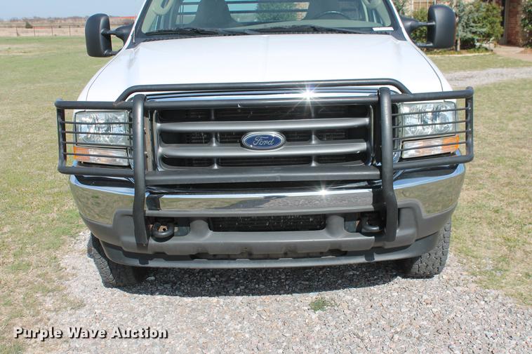 image for item AP9336 2004 Ford F350 Super Duty XLT flatbed pickup truck