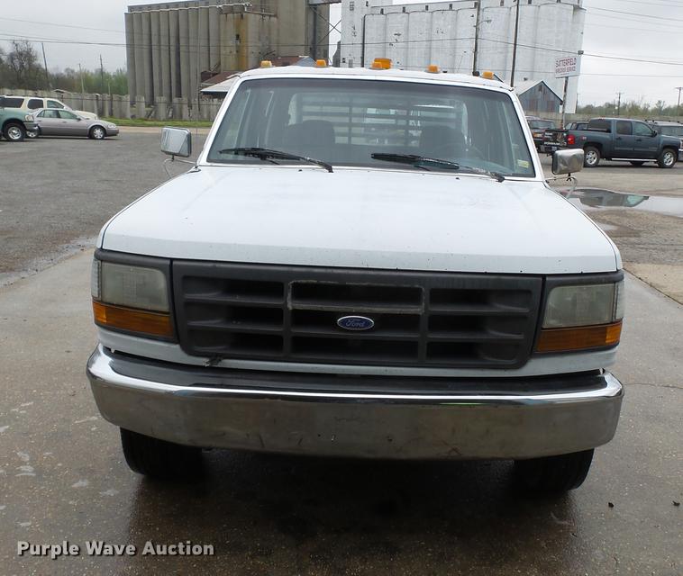 image for item DB7164 1994 Ford F350 Crew Cab flatbed truck