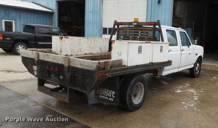 image for item DB7164 1994 Ford F350 Crew Cab flatbed truck