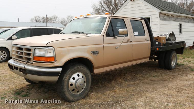image for item DC7621 1997 Ford F350 Crew Cab flatbed pickup truck