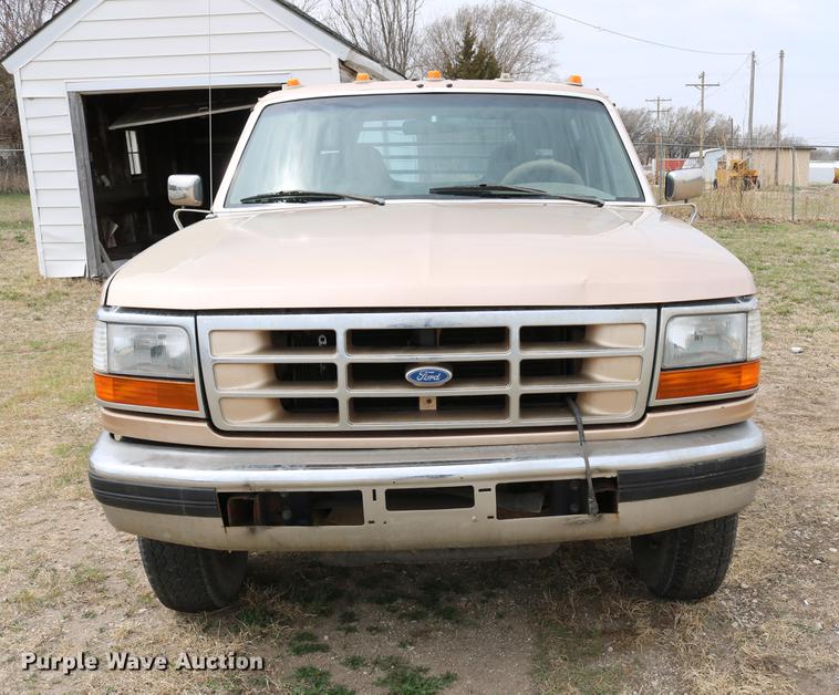 image for item DC7621 1997 Ford F350 Crew Cab flatbed pickup truck