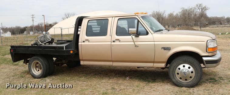 image for item DC7621 1997 Ford F350 Crew Cab flatbed pickup truck