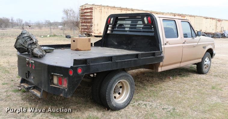 image for item DC7621 1997 Ford F350 Crew Cab flatbed pickup truck