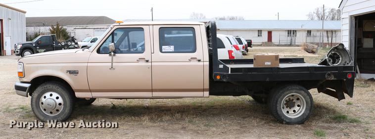 image for item DC7621 1997 Ford F350 Crew Cab flatbed pickup truck