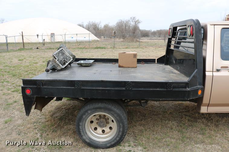 image for item DC7621 1997 Ford F350 Crew Cab flatbed pickup truck