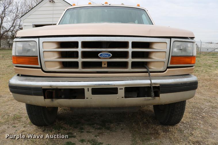 image for item DC7621 1997 Ford F350 Crew Cab flatbed pickup truck