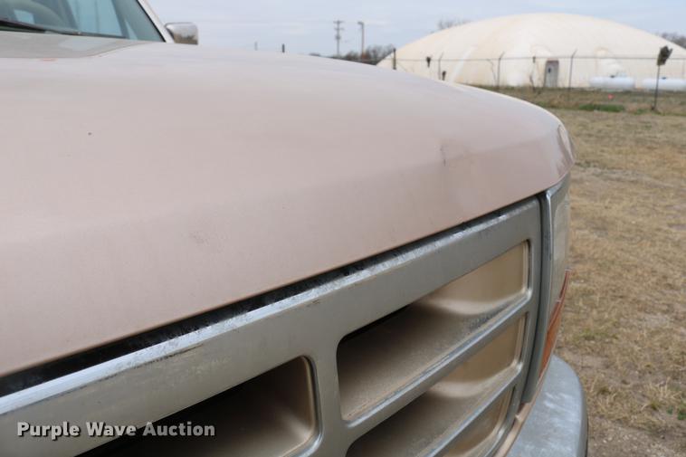 image for item DC7621 1997 Ford F350 Crew Cab flatbed pickup truck