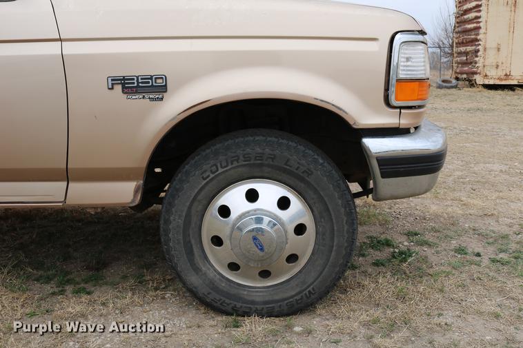 image for item DC7621 1997 Ford F350 Crew Cab flatbed pickup truck