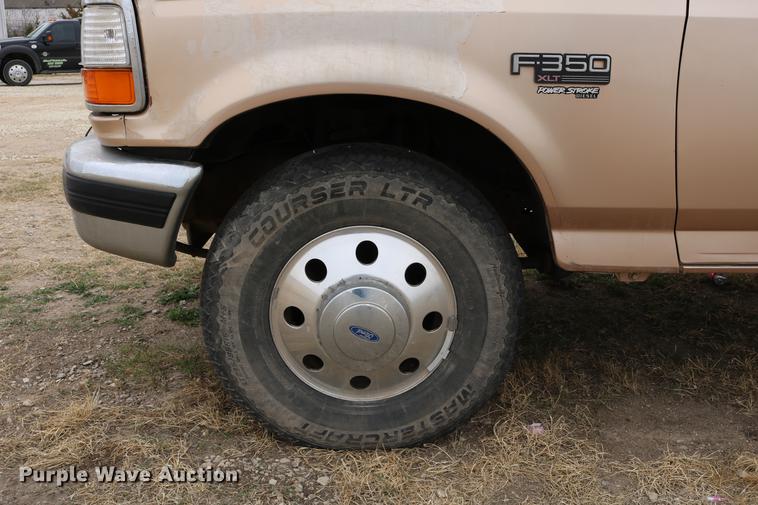 image for item DC7621 1997 Ford F350 Crew Cab flatbed pickup truck