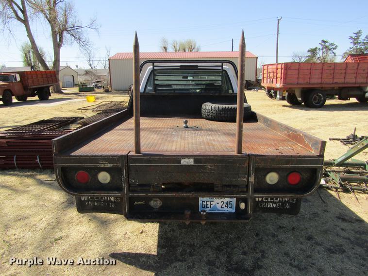 1999 Chevrolet K2500 flat bale bed pickup truck in Laverne, OK Item