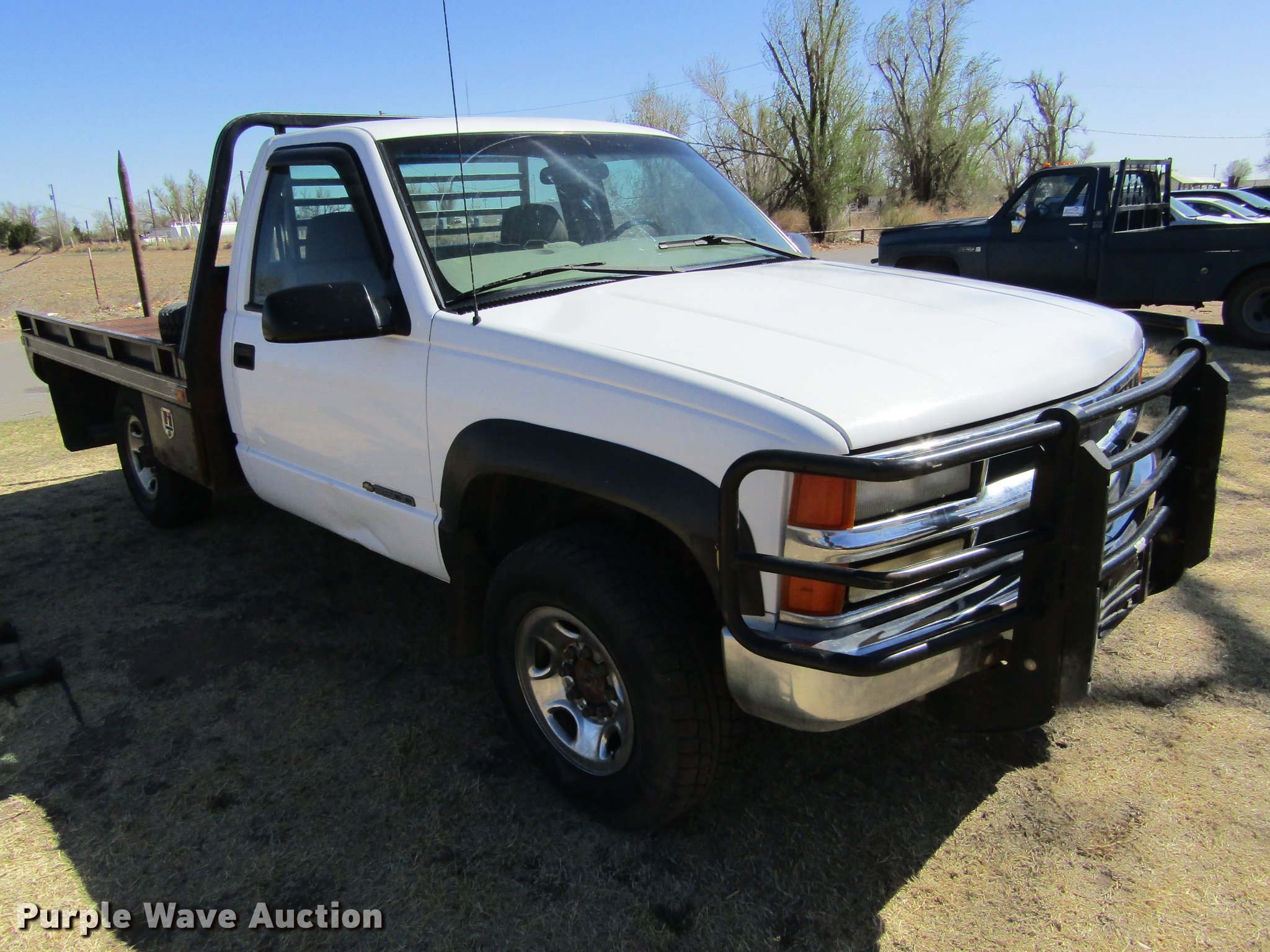 1999 Chevrolet K2500 flat bale bed pickup truck in Laverne, OK Item