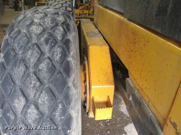 image for item DA8251 John Deere 770A motor grader