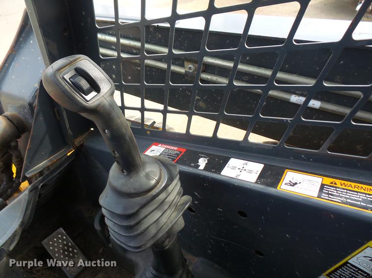 image for item DB6218 2013 John Deere 318D skid steer