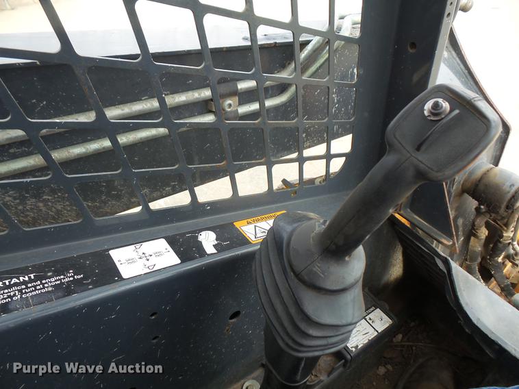 image for item DB6218 2013 John Deere 318D skid steer