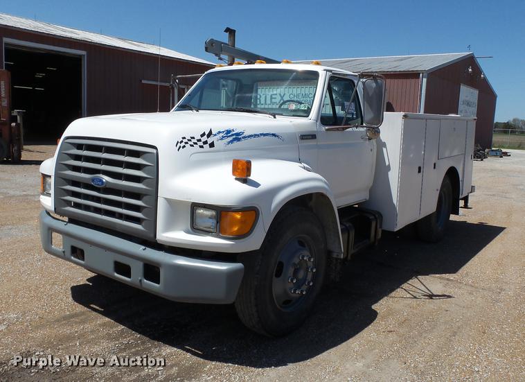 image for item DB7150 1995 Ford F800 utility bed truck with crane