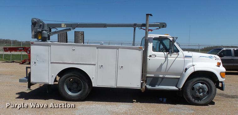 image for item DB7150 1995 Ford F800 utility bed truck with crane