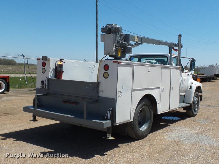 image for item DB7150 1995 Ford F800 utility bed truck with crane