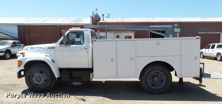 image for item DB7150 1995 Ford F800 utility bed truck with crane