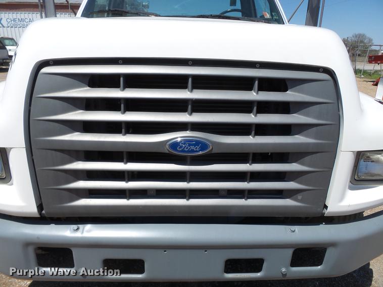 image for item DB7150 1995 Ford F800 utility bed truck with crane