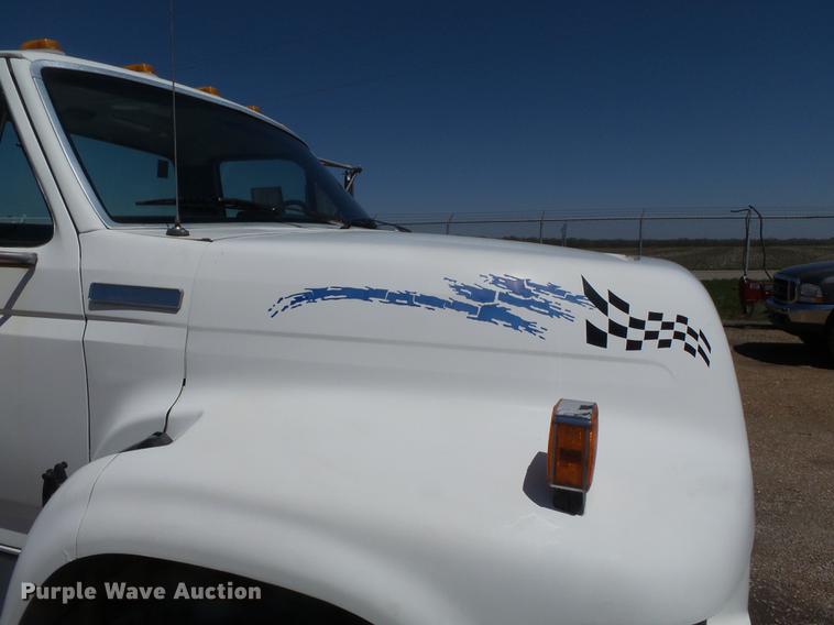 image for item DB7150 1995 Ford F800 utility bed truck with crane