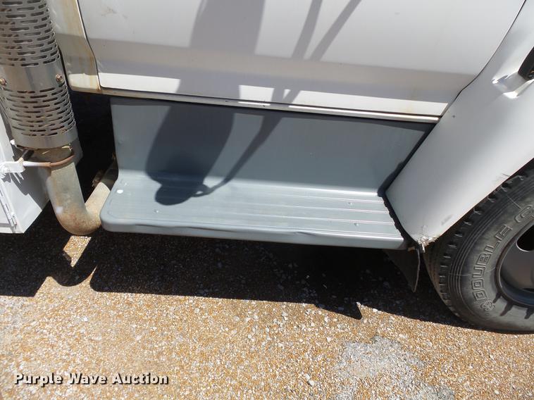 image for item DB7150 1995 Ford F800 utility bed truck with crane