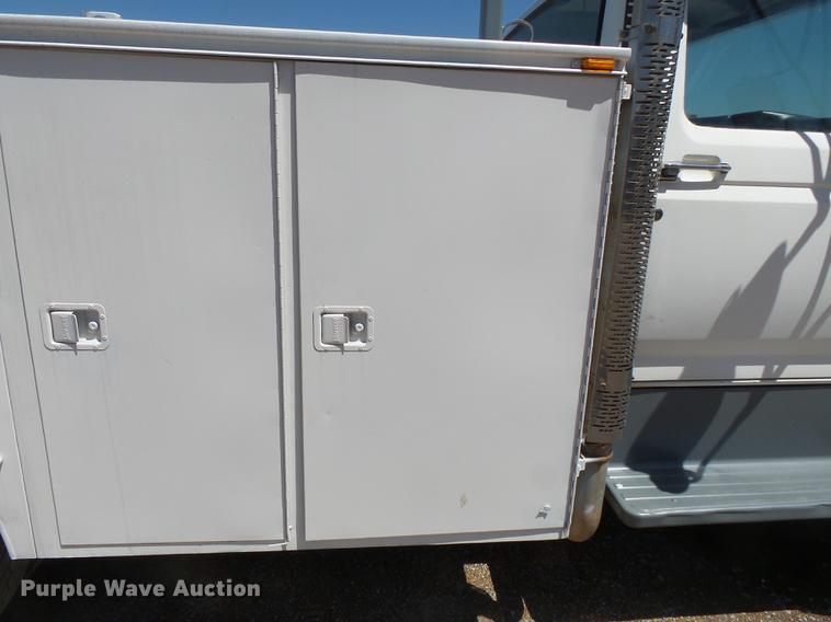 image for item DB7150 1995 Ford F800 utility bed truck with crane