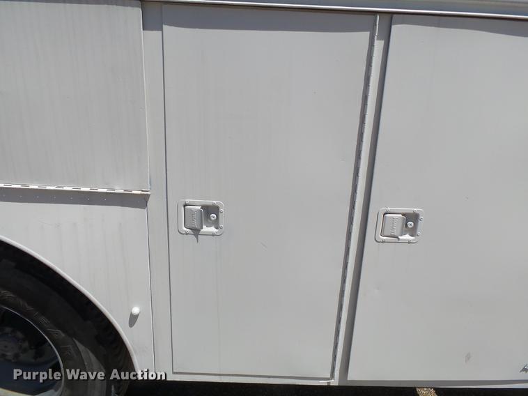 image for item DB7150 1995 Ford F800 utility bed truck with crane