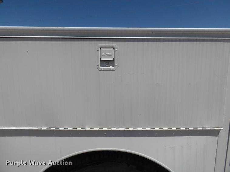 image for item DB7150 1995 Ford F800 utility bed truck with crane