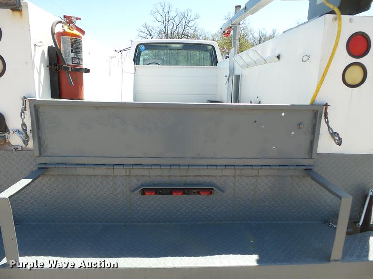 image for item DB7150 1995 Ford F800 utility bed truck with crane