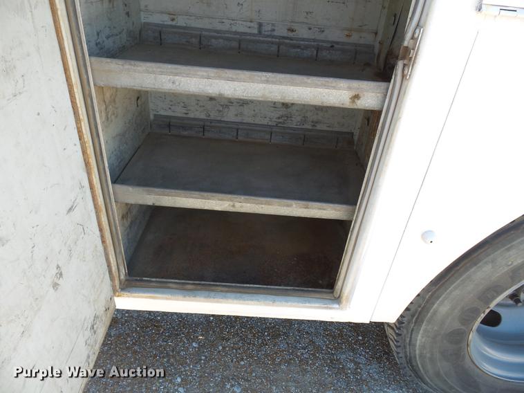 image for item DB7150 1995 Ford F800 utility bed truck with crane