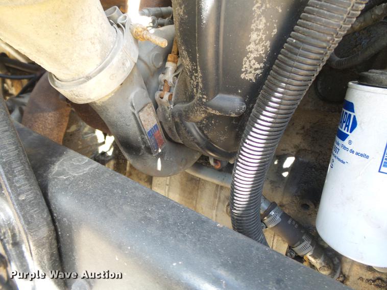 image for item DB7150 1995 Ford F800 utility bed truck with crane