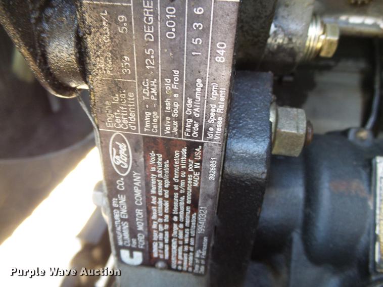 image for item DB7150 1995 Ford F800 utility bed truck with crane