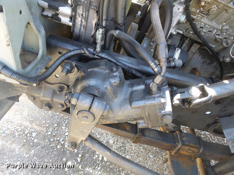 image for item DB7150 1995 Ford F800 utility bed truck with crane