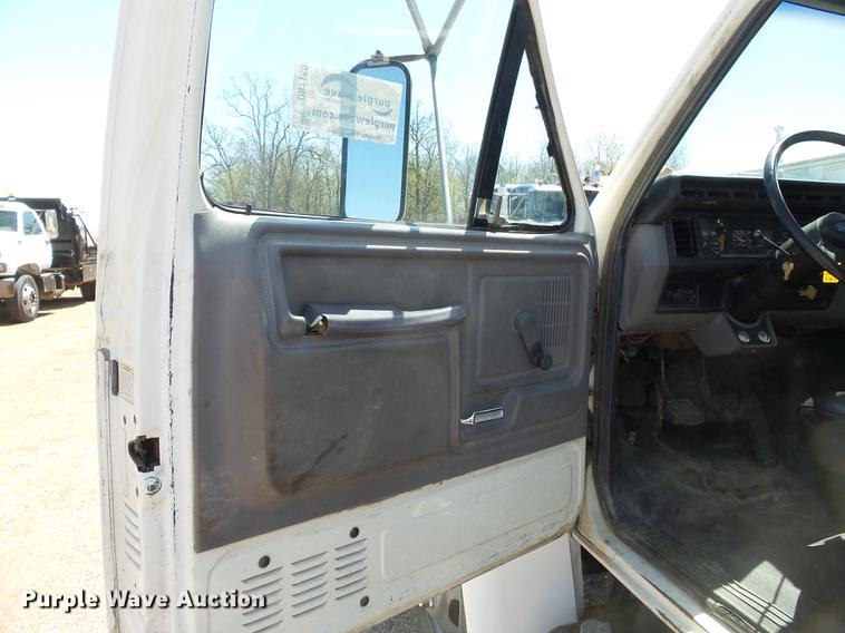 image for item DB7150 1995 Ford F800 utility bed truck with crane