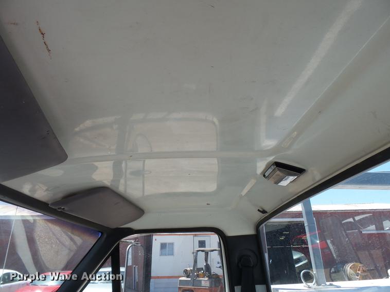 image for item DB7150 1995 Ford F800 utility bed truck with crane