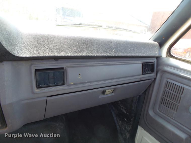 image for item DB7150 1995 Ford F800 utility bed truck with crane