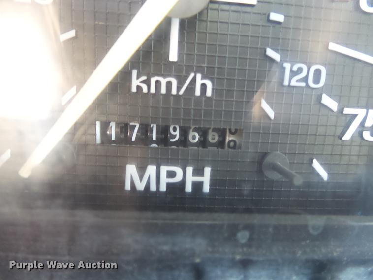 image for item DB7150 1995 Ford F800 utility bed truck with crane