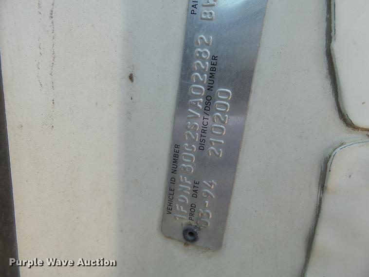 image for item DB7150 1995 Ford F800 utility bed truck with crane