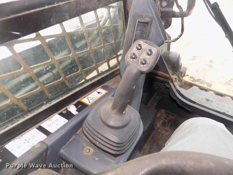 image for item DD2784 2012 John Deere 323DT skid steer