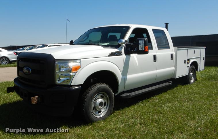 image for item DC0466 2012 Ford F250 Super Duty Crew Cab utility bed pickup truck