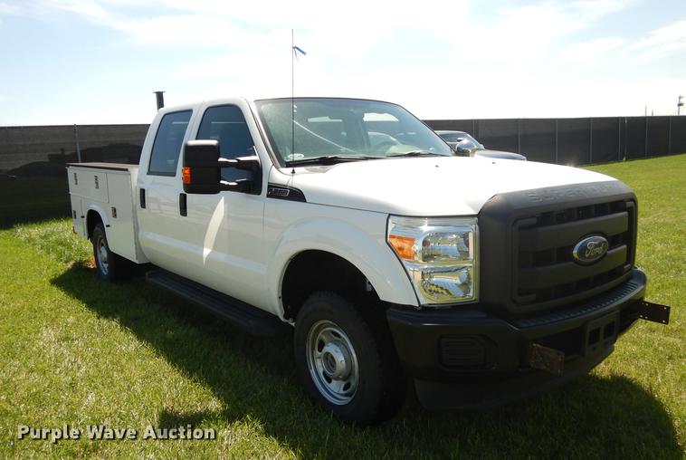 image for item DC0466 2012 Ford F250 Super Duty Crew Cab utility bed pickup truck