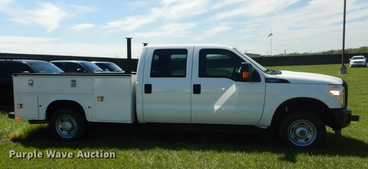 image for item DC0466 2012 Ford F250 Super Duty Crew Cab utility bed pickup truck