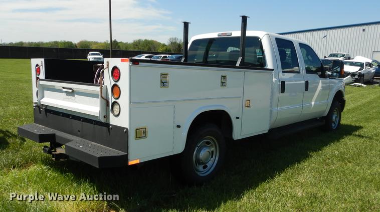 image for item DC0466 2012 Ford F250 Super Duty Crew Cab utility bed pickup truck