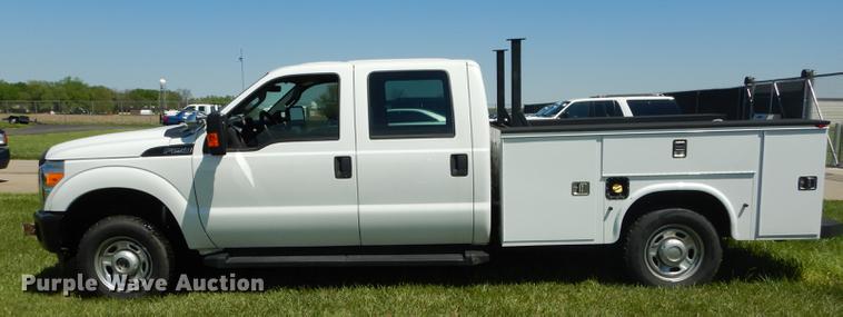 image for item DC0466 2012 Ford F250 Super Duty Crew Cab utility bed pickup truck
