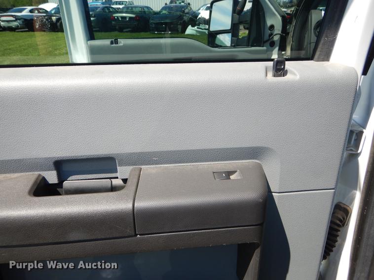 image for item DC0466 2012 Ford F250 Super Duty Crew Cab utility bed pickup truck