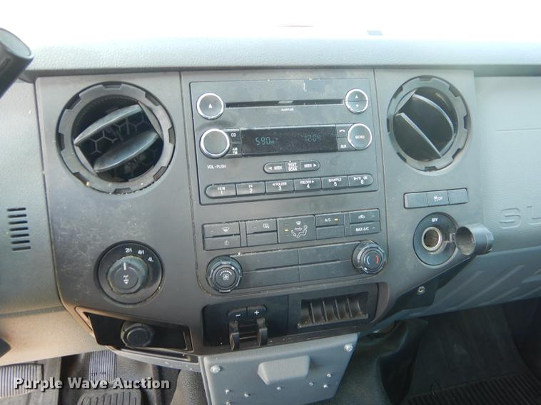 image for item DC0466 2012 Ford F250 Super Duty Crew Cab utility bed pickup truck