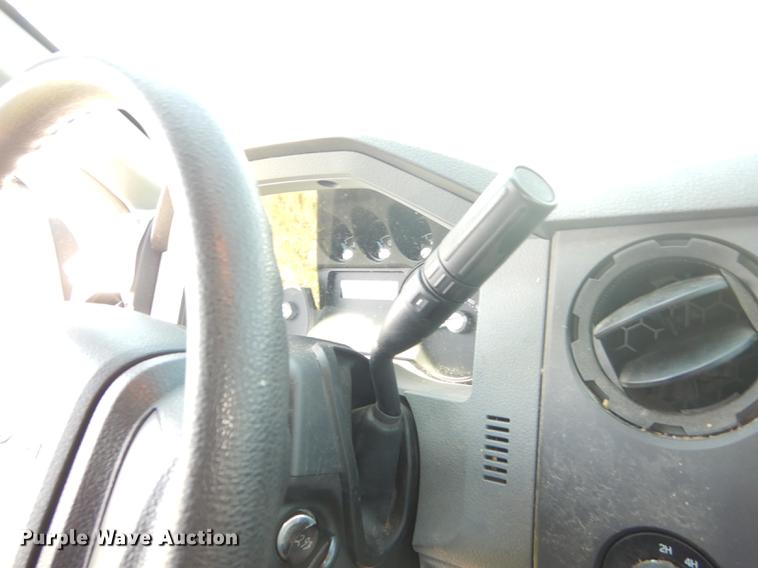 image for item DC0466 2012 Ford F250 Super Duty Crew Cab utility bed pickup truck