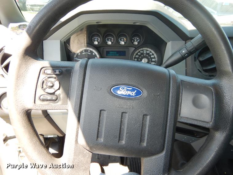 image for item DC0466 2012 Ford F250 Super Duty Crew Cab utility bed pickup truck