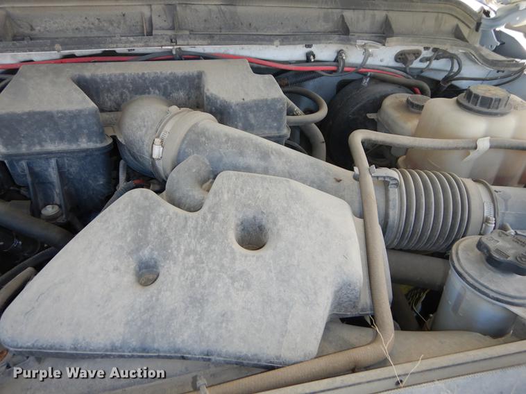 image for item DC0466 2012 Ford F250 Super Duty Crew Cab utility bed pickup truck